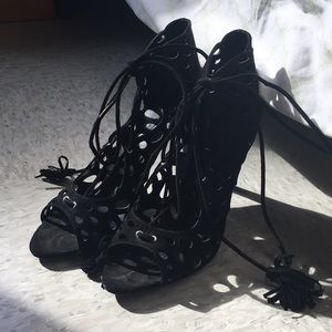Black open-toe high heels with laces